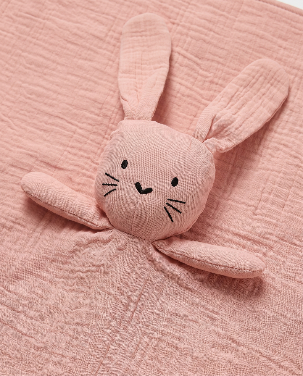 doudou lapin visage brodé détail amande corail la câline